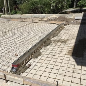 Heavy duty polymer, concrete garage trench drain system